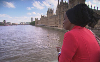 Leyla Hussein looks out over the River Thames from Westminster Bridge, near the Houses of Parliament.